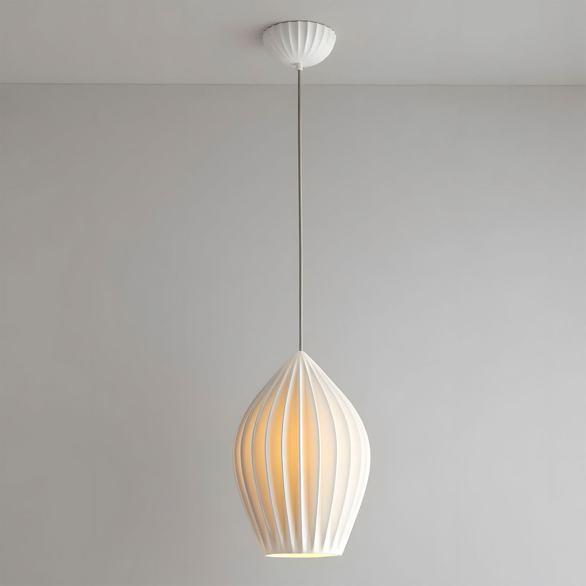 White fluted ceramic pendant light with a ribbed teardrop shade, view 19
