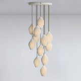 White fluted ceramic pendant light with a ribbed teardrop shade, view 25