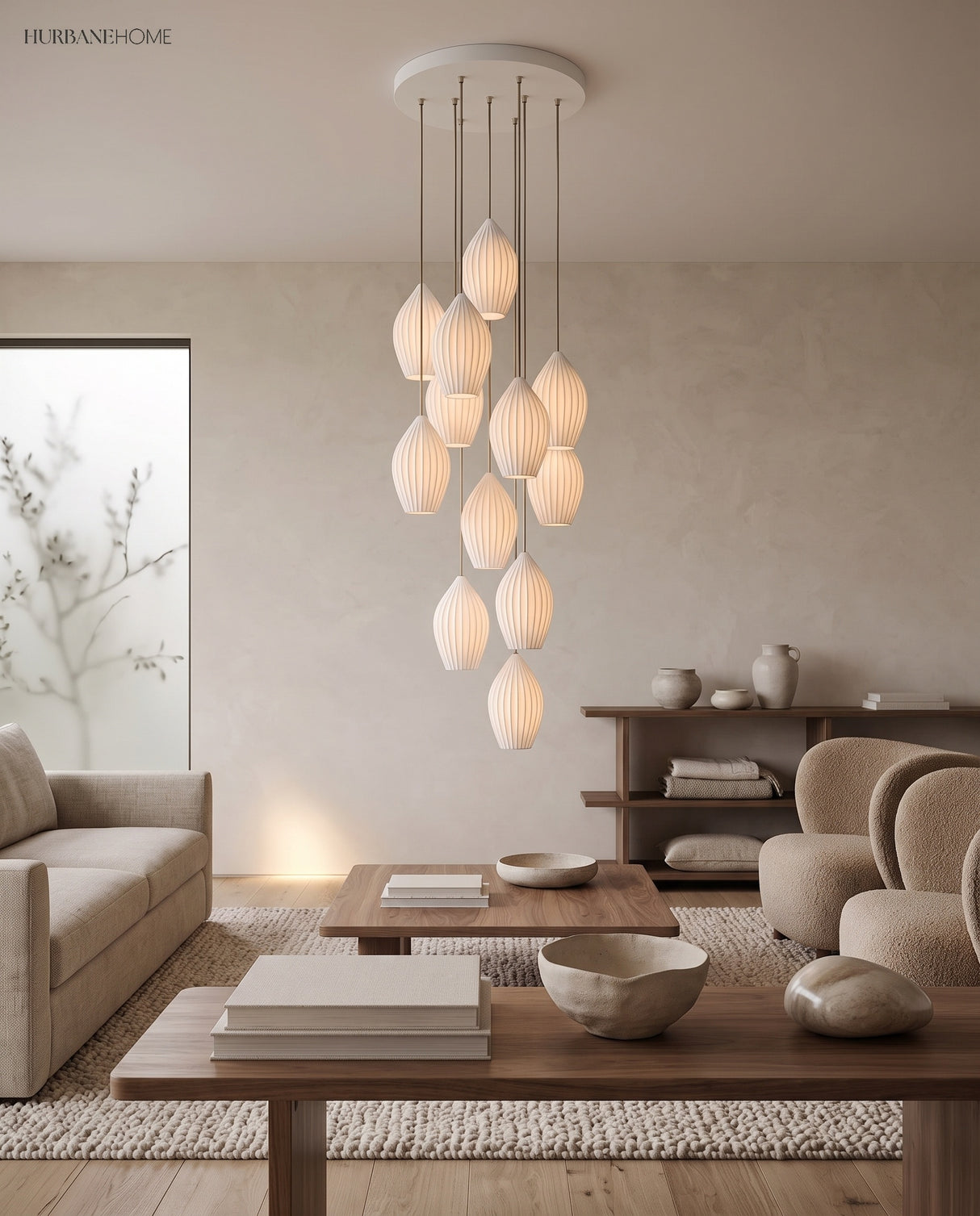 Cluster of fluted ceramic pendants at staggered heights in a lounge