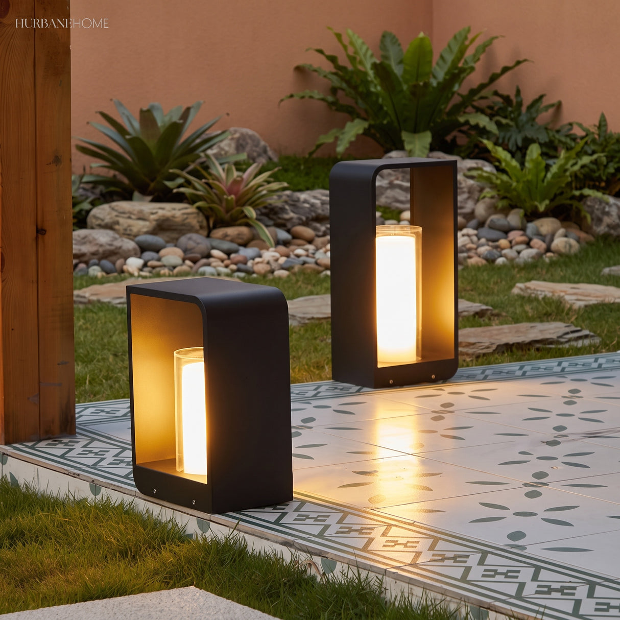 Square frame outdoor lawn bollard light in a garden setting