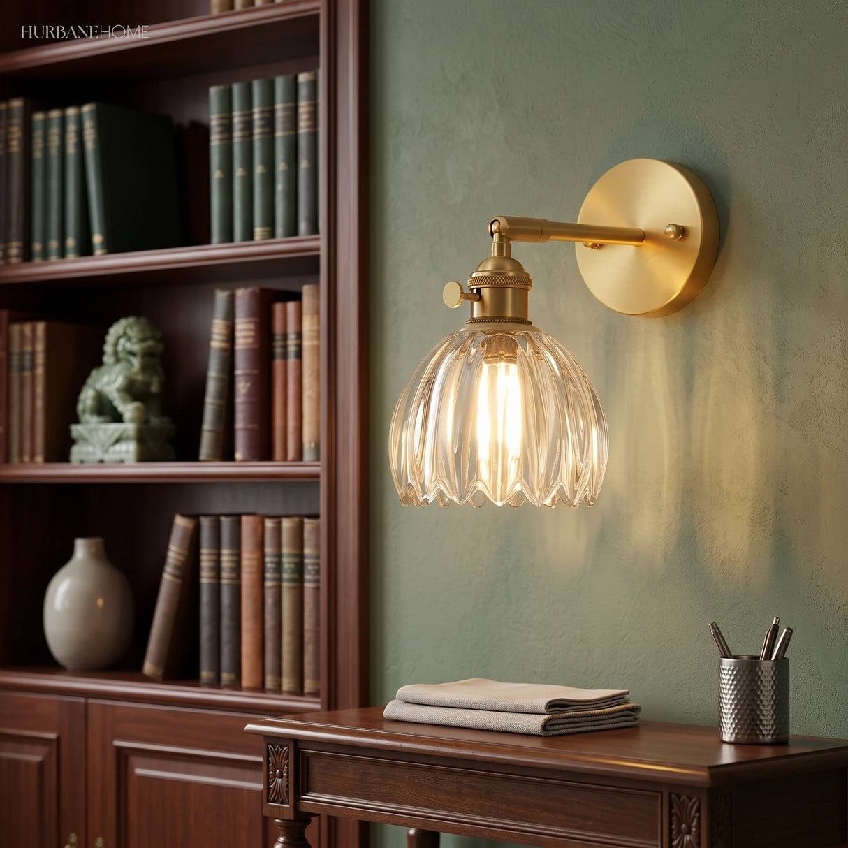 Amber lotus wall sconce beside a bookshelf