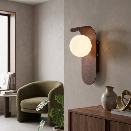 Frosted glass globe wall sconce with curved wood tone backplate