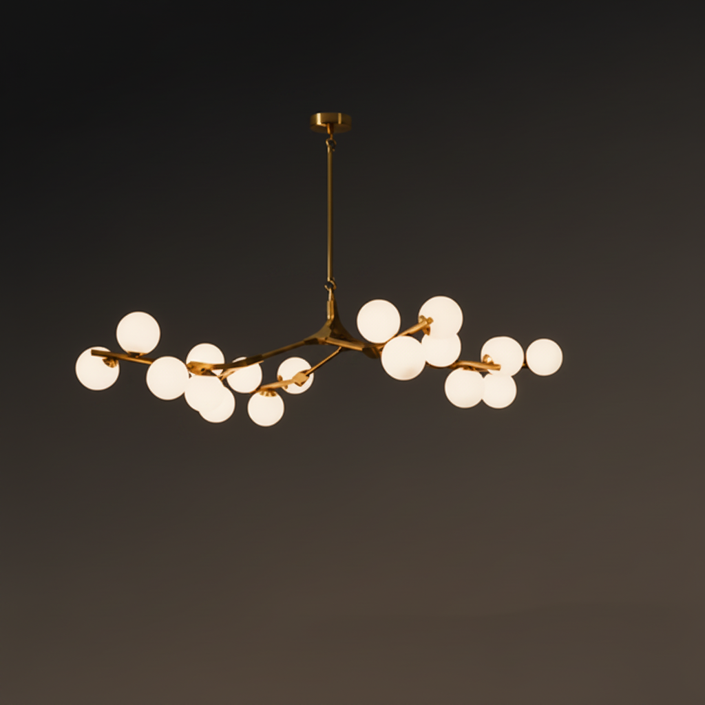 Gold branch chandelier lit against a dark background showing its spread
