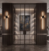 Slim LED wall light bar mounted on a neutral accent wall
