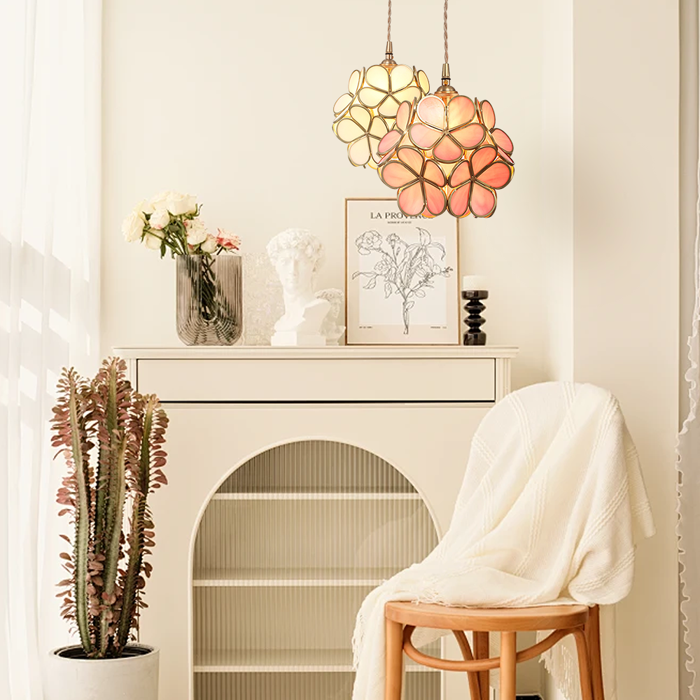 Overhead cluster view of glass flower petals forming the pendant shade