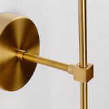 Close detail of a glass globe wall sconce socket and shade