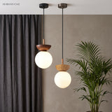 Glass globe ceiling light in a styled interior