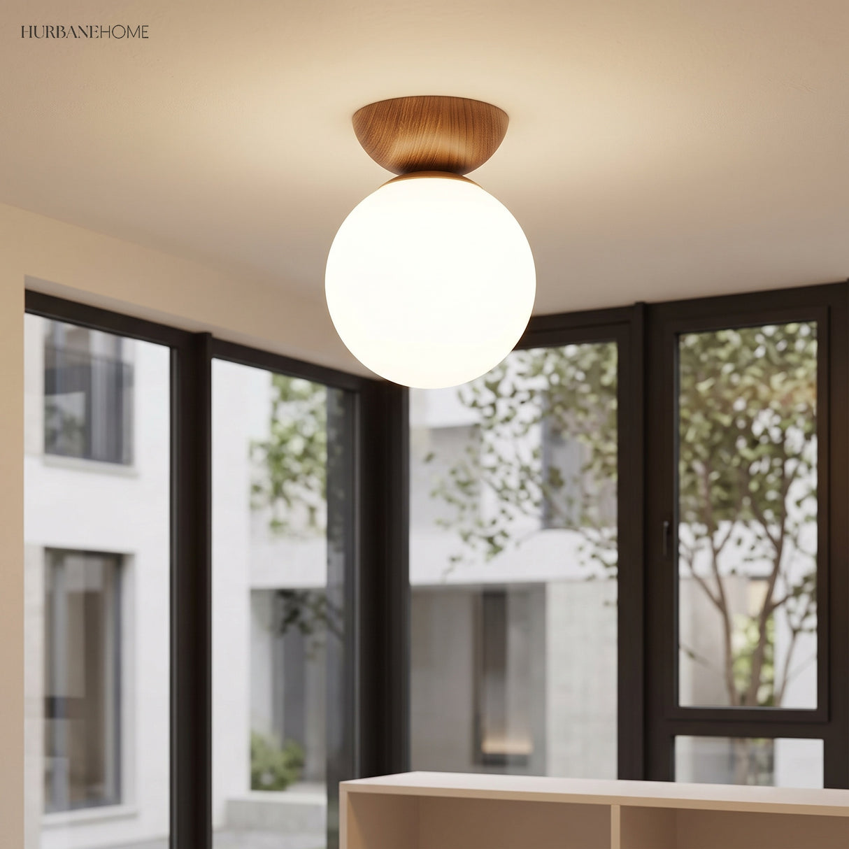 Glass globe semi-flush ceiling light in a styled interior