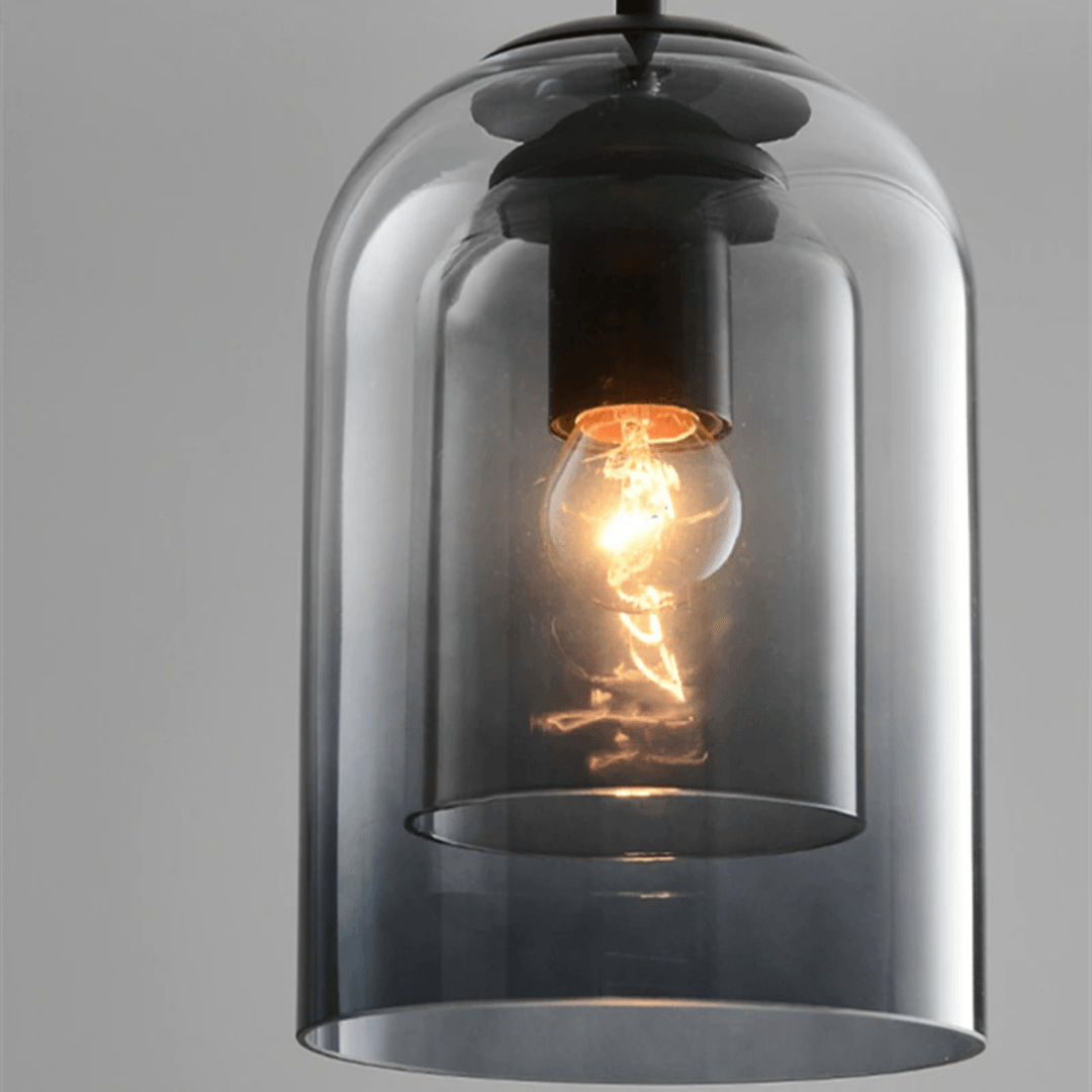 Close view of the filament bulb inside the inner glass cylinder