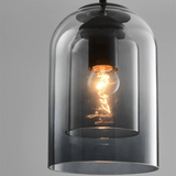 Close view of the filament bulb inside the inner glass cylinder