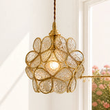 Studio view of the glass petal pendant light with twisted fabric cord