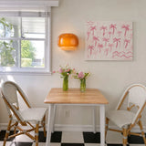 Glass wall sconce paired with wood panelling and neutral decor accents