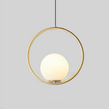 Gold round hoop pendant with a lit glass globe on a grey background