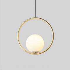 Gold round hoop pendant with a lit glass globe on a grey background
