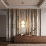 Opal globe pendant lit in front of a veined stone feature wall