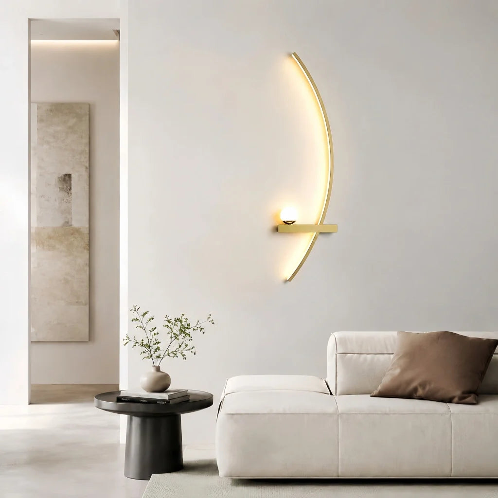 Gold arc LED wall light detail showing the slim linear band and globe