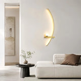 Gold arc LED wall light detail showing the slim linear band and globe