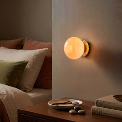 Glass globe sconce with a chrome scalloped round backplate, view 2