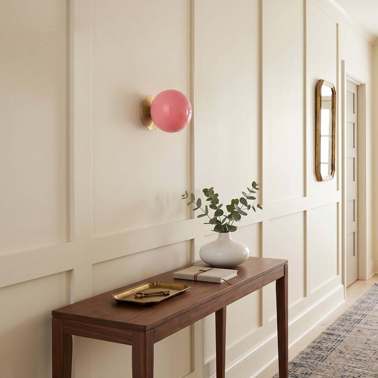 Wall mounted glass globe sconce with a fluted metal backplate, view 5