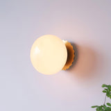 Glass globe sconce with a chrome scalloped round backplate, view 14