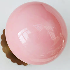 Opal glass globe wall sconce on a gold scalloped backplate, view 19