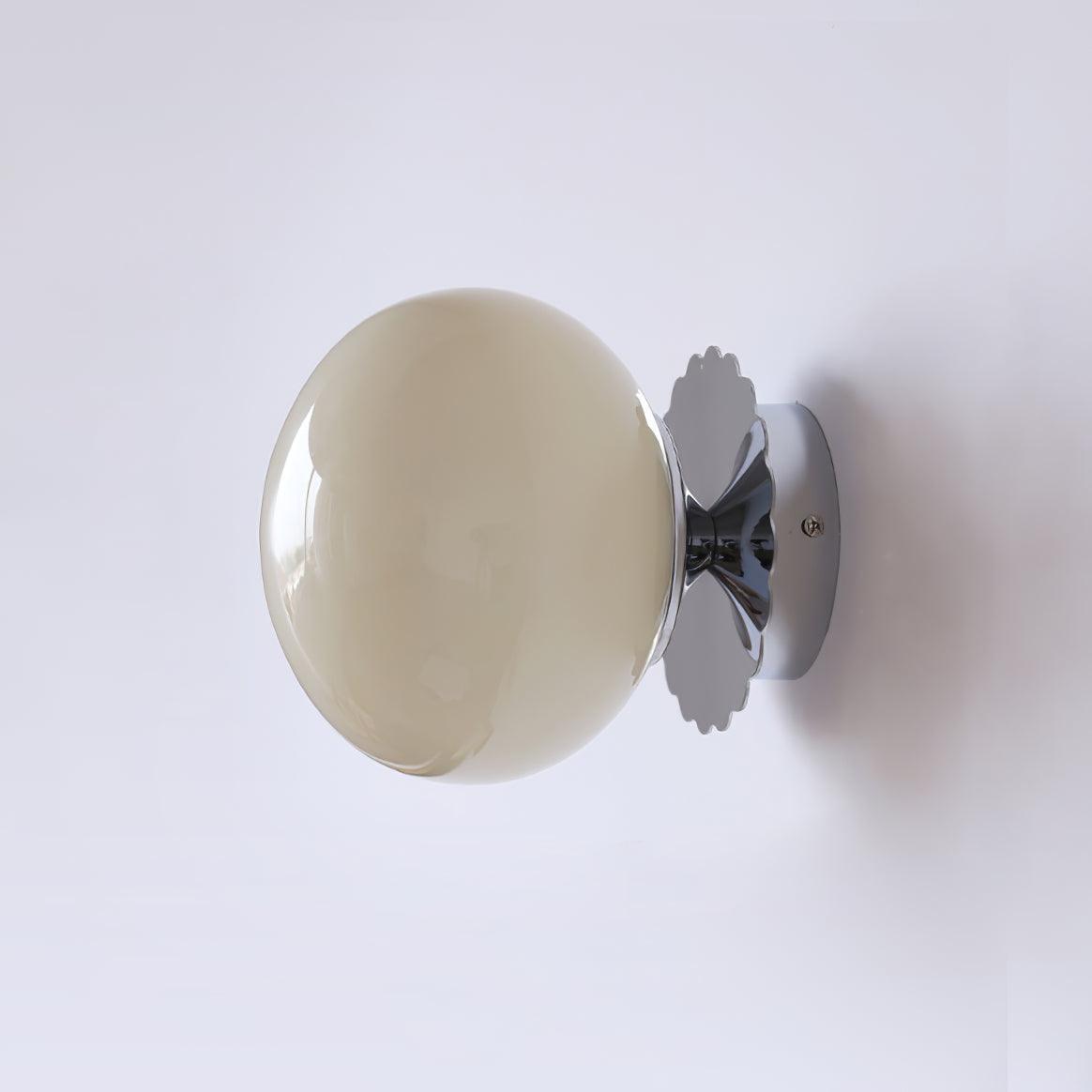 Opal glass globe wall sconce on a gold scalloped backplate, view 25