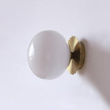 Glass globe sconce with a chrome scalloped round backplate, view 26