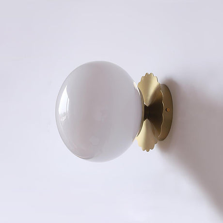 Glass globe sconce with a chrome scalloped round backplate, view 26