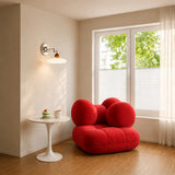 Green shade swing arm wall lamp shown against a plain background