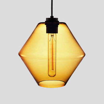 Amber faceted glass pendant with angled sides and a filament bulb