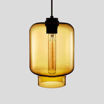 Amber tapered glass pendant with a black cap and filament bulb