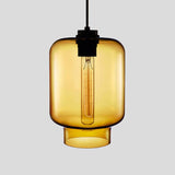 Amber tapered glass pendant with a black cap and filament bulb