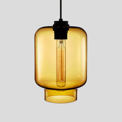 Amber tapered glass pendant with a black cap and filament bulb