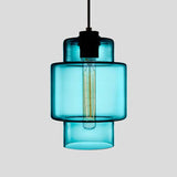 Blue stepped glass pendant with a wide upper band, shown lit