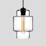 Clear stepped glass pendant with a wide upper band, shown lit