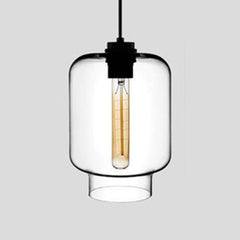 Clear tapered glass pendant with a black cap, lit against grey