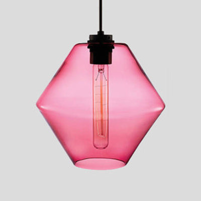 Pink faceted glass pendant with angled sides and a filament bulb