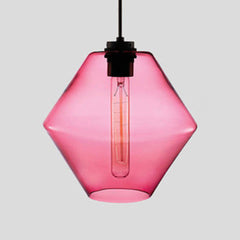Pink faceted glass pendant with angled sides and a filament bulb
