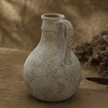 Handmade ceramic vases displayed as retro tabletop decor