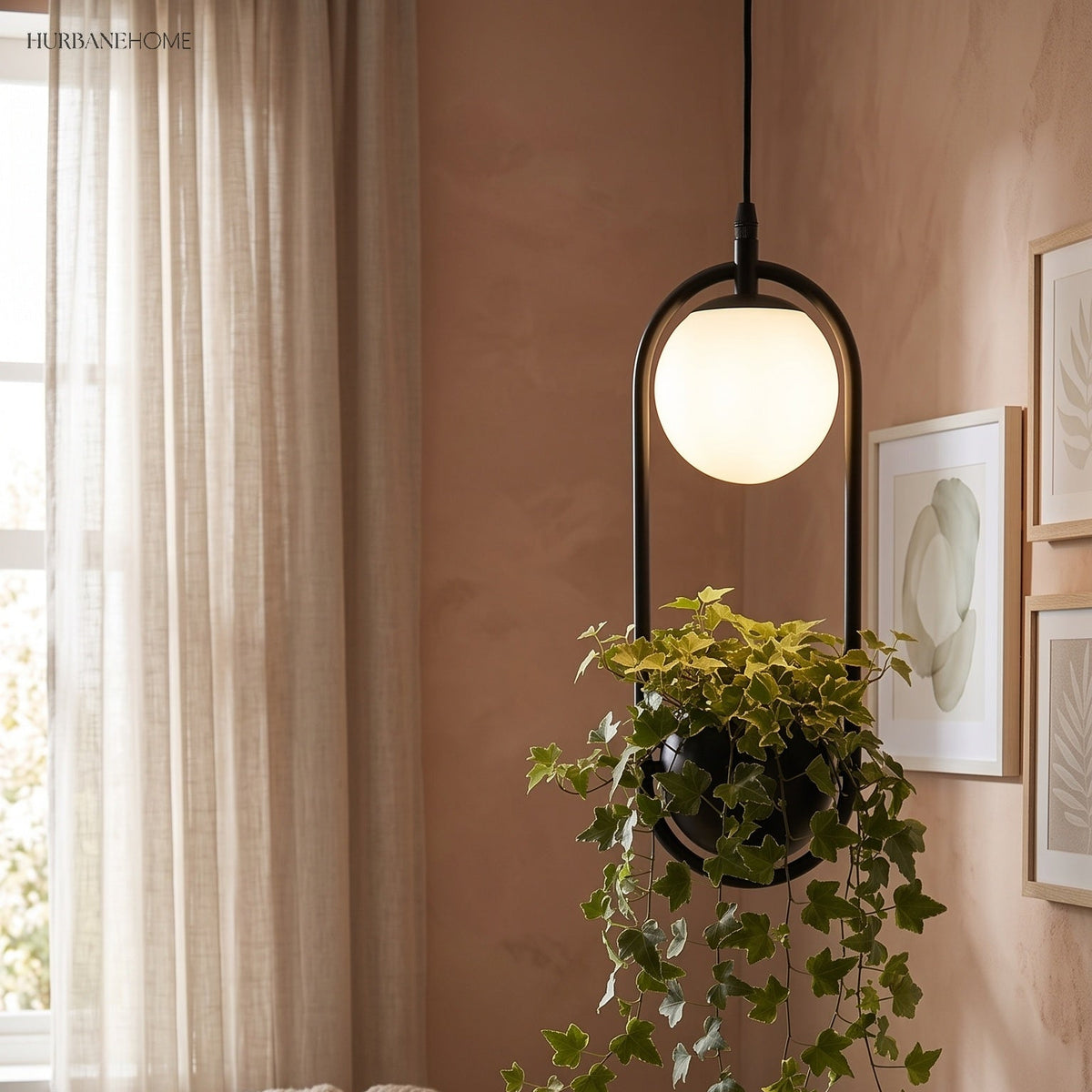 Planter pendant with trailing ivy beside a cream armchair