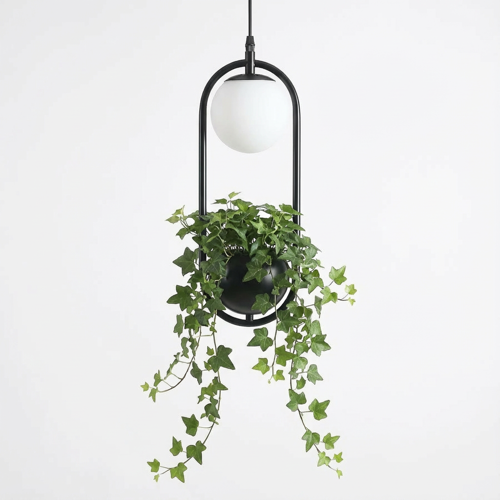 Black hoop planter pendant with ivy on a plain white background