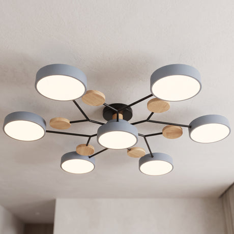 Modern circular LED ceiling light with grey discs and wood accents mounted on a plain ceiling