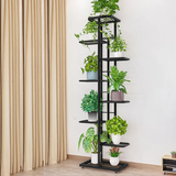 Vertical metal rack organizing several pots indoors – indoor plant stands for multiple plants