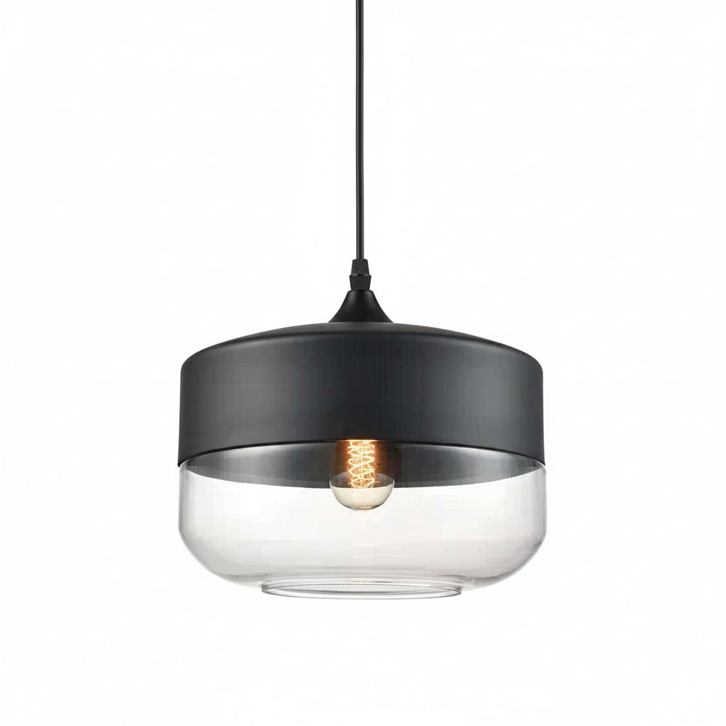 Clear glass drum shade with a black metal cap on white