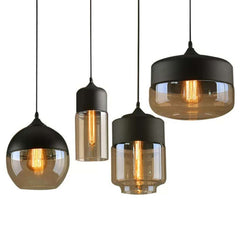 Four pendant shapes hanging together, globe, cylinder, lantern and drum