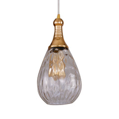 Brass capped teardrop pendant with a clear dimpled glass shade