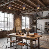 Row of three ribbed ceiling lights above a long loft dining table