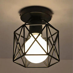 Close view of the open metal cage and its exposed globe bulb