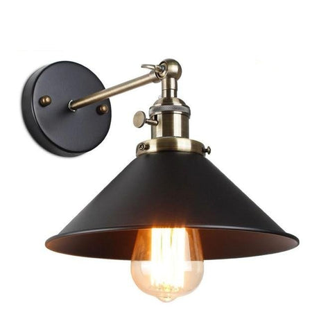 Black cone shade sconce with a polished brass socket and thumbscrews
