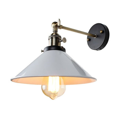 White cone shade sconce with polished brass arm seen from the side